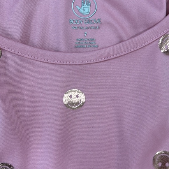 Body glove romper smiley face pink with gold smiles. Size 7
Sleeveless - Picture 4 of 12